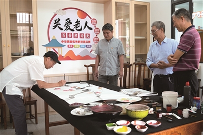 书画名家欧阳耀东回到均安新华社区交流创作