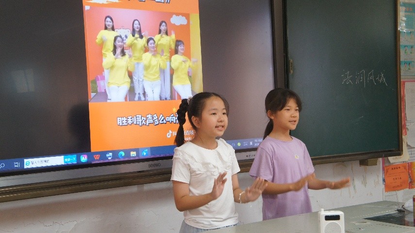 佛山大学法学院&ldquo;法润凤城&rdquo;实践队 | 红歌伴舞润童心，厚植少年爱国情怀