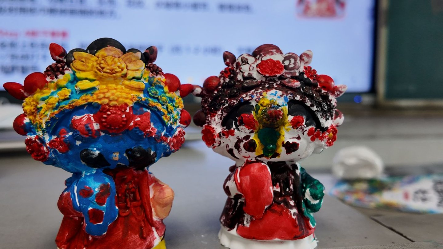 粉绘梨园娃娃像 粤韵新风润童心